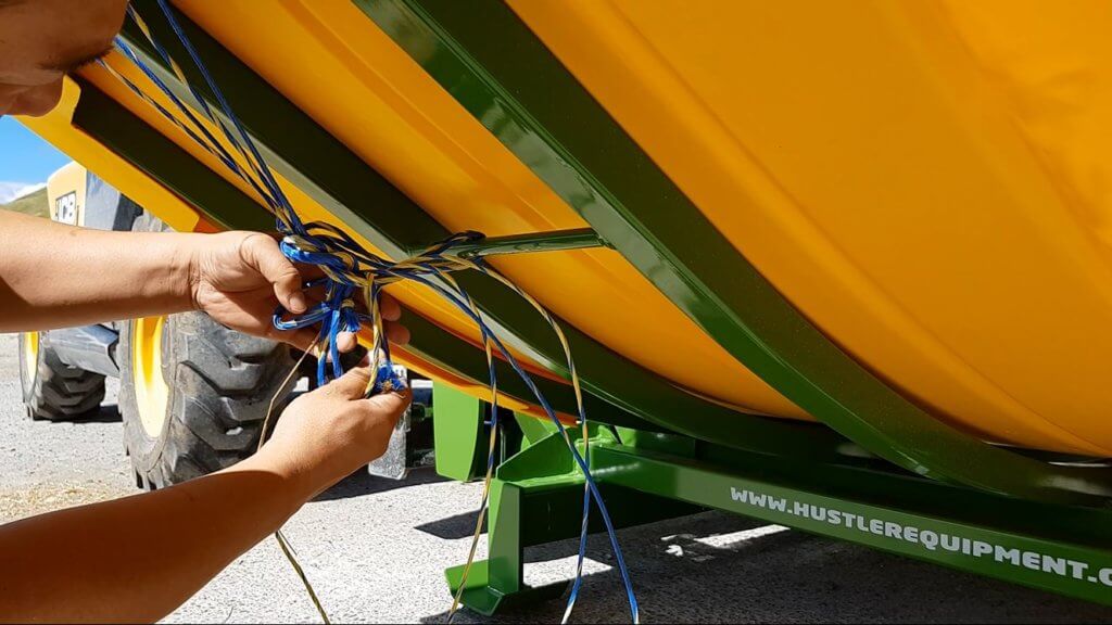 round bale feeder tie point for strings
