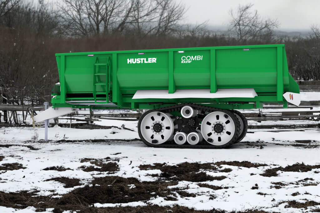 Hustler RX218² with tracks in a snowy field